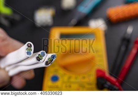 Copper Wire And Other Tools On The Workbench. Accessories For Repair And Installation Of Electrical