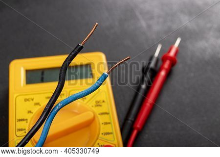 Copper Wire And Other Tools On The Workbench. Accessories For Repair And Installation Of Electrical
