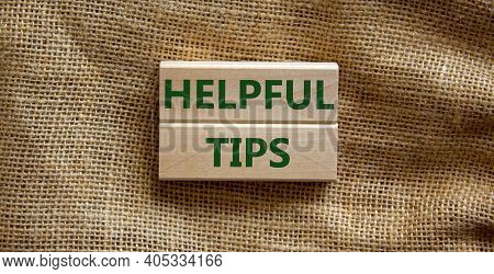 Helpful Tips Symbol. Wooden Blocks With Words 'helpful Tips'. Beautiful Canvas Background. Business 
