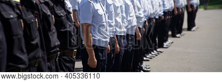 The Line Of A Detachment Of Police Officers On A City Street Or Square. Problems Of Opposition Ralli