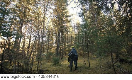 The Woman Travel On Mixed Terrain Cycle Touring With Bike Bikepacking. The Traveler Journey With Bic