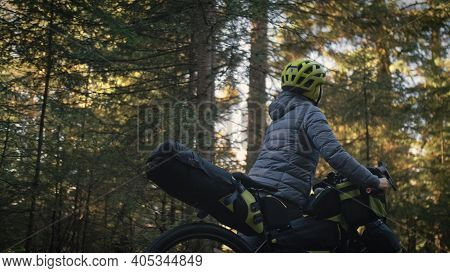The Woman Travel On Mixed Terrain Cycle Touring With Bike Bikepacking. The Traveler Journey With Bic