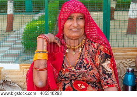 Jaisalmer, Rajasthan, India - 15th October 2019 : Smiling Rajatshani Woman With Colourful Dress At T