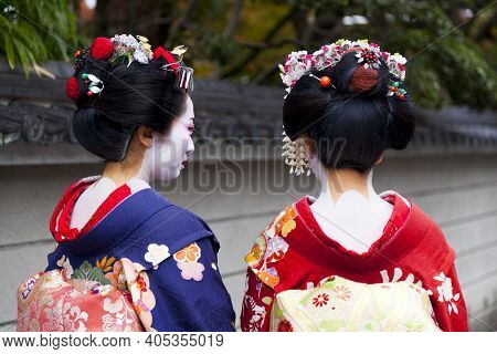 Kyoto, Japan - Dec 6 : Apprentice Geisha,maiko With Umbrella In Kyoto, Japan On December 6,2015. App
