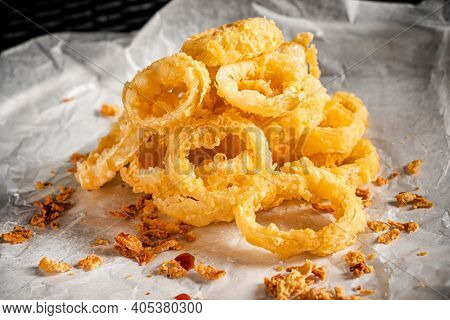 Delicious golden battered, breaded and deep fried crispy onion rings