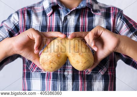 Trendy Ugly Vegetable, Human Lungs Shaped Potato In Hands