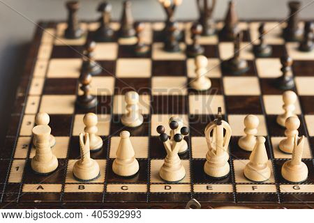 Wooden Chess Board And Chess Pieces On It. Intellectual Board Game, Selective Focus.