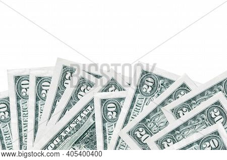 20 Us Dollars Bills Lies On Bottom Side Of Screen Isolated On White Background With Copy Space. Back
