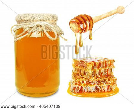 multiflorous honey in a jar, honeycomb and dipper