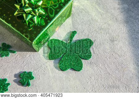 Happy St. Patrick's Day. Card With  Lucky Clover, Green Gift Box. Irish Festival Symbol. Lucky Conce