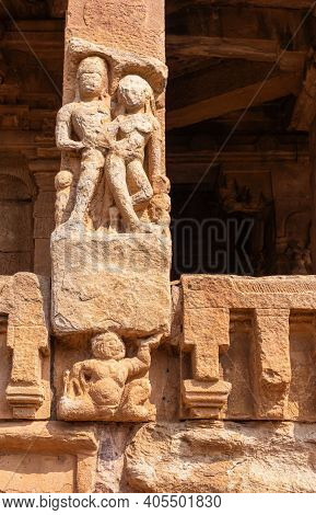 Aihole, Karnataka, India - November 7, 2013: Durga Gudi Or Temple. Closeup Of Damaged Red Stone Pill