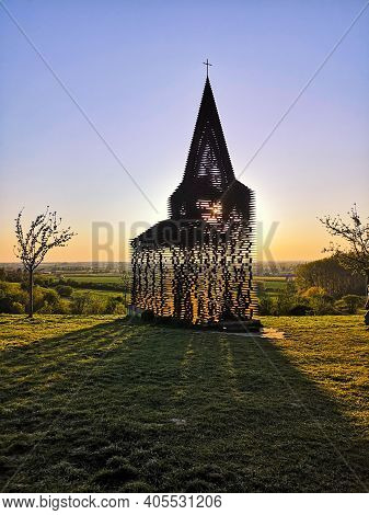 Borgloon, Belgium - April 2019: Famous Steel See-through Church Landmark By Gijs Van Vaerenbergh Cal