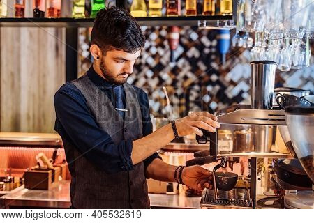 Close-up Of Barista Making Espresso From A Coffee Machine In A Restaurant, Bar Or Pub. Professional