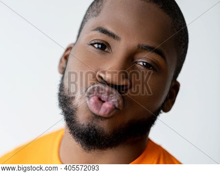 Air Kiss. Romantic Message. Admiration Appreciation. Care Affection. Cute Friendly African Guy Face 