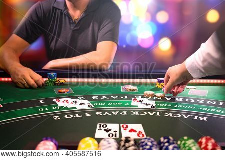 Man playing BlackJack at the casino - Shallow depth of field
