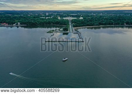 Panoramic Aerial View Of The Lower Park In Peterhof. Pier. The Gulf Of Finland. Summer. Green Trees.