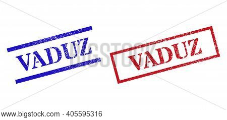 Grunge Vaduz Rubber Stamps In Red And Blue Colors. Stamps Have Rubber Surface. Vector Rubber Imitati