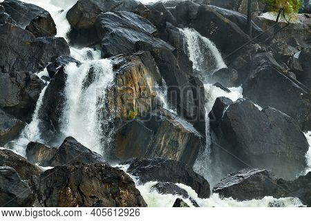 Russia. Mountain Altai. A Fragment Of The Uchar Cascade Waterfall On The Chulcha River, The Right Tr