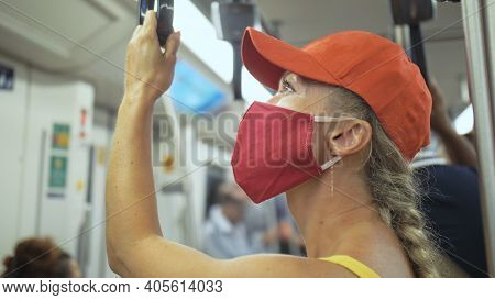 Woman Travel Caucasian Ride At Overground Train Airtrain With Wearing Protective Medical Mask. Girl 