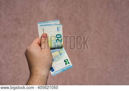 Hand Couting Holding And Showing Euro Money Or Giving Money. World Money Concept, 20 Euro Banknotes 