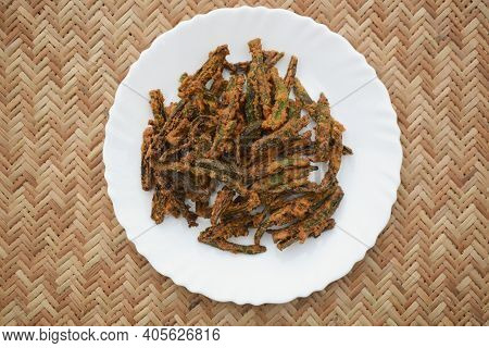 Indian Special Dish Okra Fry With Gramflour Also Known As Kurkuri Bhindi. Served As Starter Snack Wi