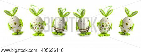 Easter Eggs. Happy Easter Card. Multicolored Easter Eggs. Easter. Easter Eggs On A White Wooden Back
