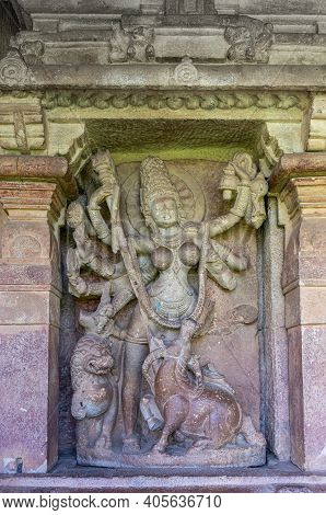 Aihole, Karnataka, India - November 7, 2013: Durga Gudi Or Temple. Gray Stone Statue Of Durga As Mah