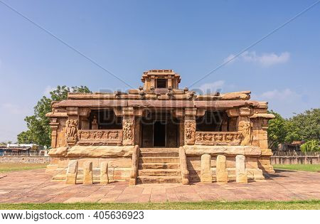 Aihole, Karnataka, India - November 7, 2013: Lad Khan Temple Under Blue Sky. Brown Stone Building Wi