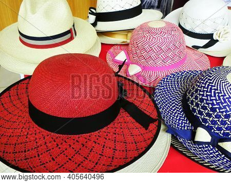 Colorful Handmade Panama Hats Or Paja Toquilla Hats Or Sombreros At The Traditional Outdoor Market I