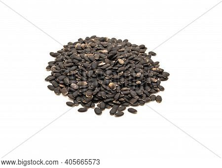 Studio Shot Pile Of Luffa Or Loofah, Luffa Aegyptiaca Seeds Isolated On White Background