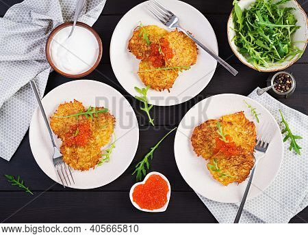 Fried Potato Pancakes With Red Caviar And Sour Cream, Fritter, Roesti. Traditional Delicious Food, L