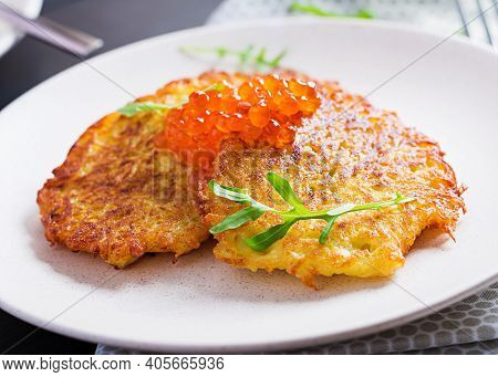 Fried Potato Pancakes With Red Caviar And Sour Cream, Fritter, Roesti. Traditional Delicious Food, L