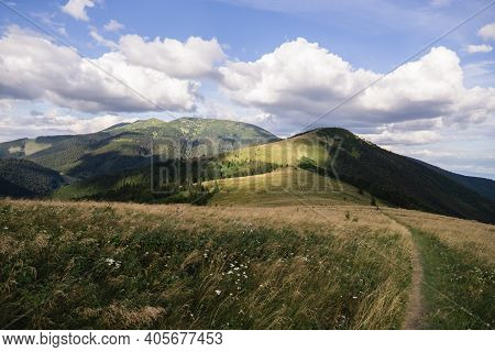 Tiny Path Up To The Mountain Peaks