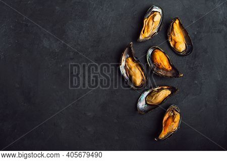 Large Mussels On A Black Background. Top View With Space For Text. Many.