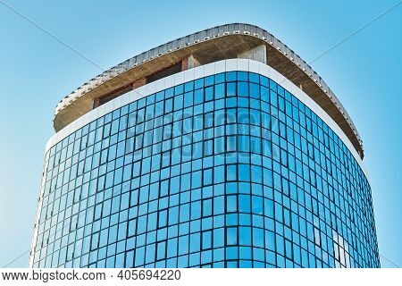 High New Skyscraper Building Top Against Clear Blue Sky