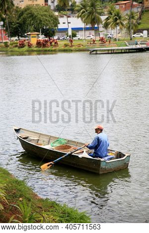Fisherman On Lake Fishing