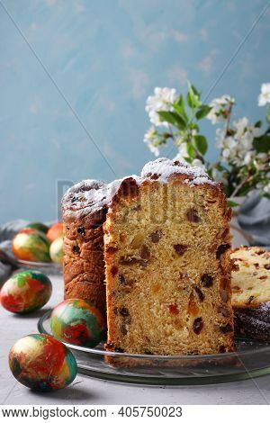 Easter Cake Craffin And Marble Colorful Eggs On A Light Blue Background. Concept Of The Spring Ortho