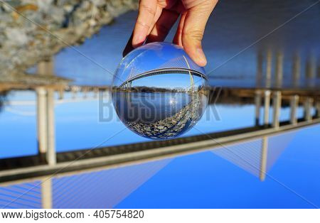 The View Of William V Roth Bridge Captured Through A Crystal Lens Ball Near Middletown, Delaware, U.