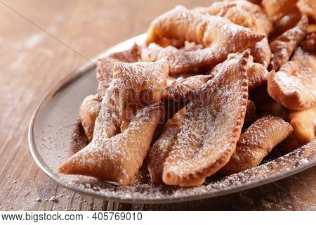 traditional fried bugne with sugar 