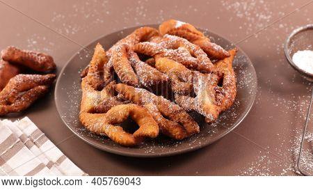 fried bugnes- angels wings and sugard