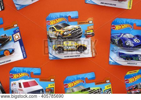 Ukraine, Kyiv - February 28. 2020: The Group Of Colorful Toy Car Collection On Orange Background. Ho