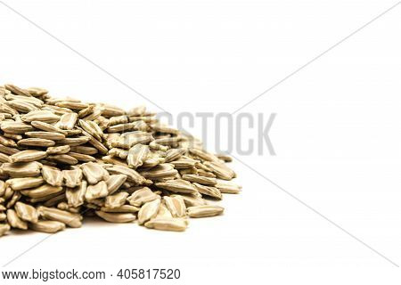 Close-up Pile Of Opo Gourd Or Calabash Squash Seeds Isolated On White Background With Copy Space