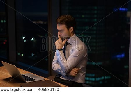 Doubtful Businessman Ponder By Computer Hesitate Before Making Risky Decision