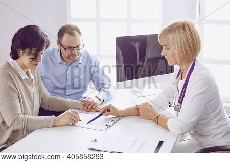 Couple At Reception Discussing Issues With A Sexologist