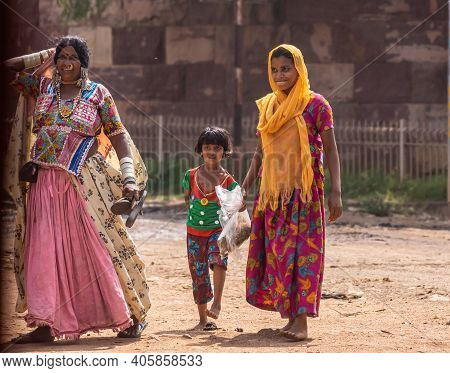 Aihole, Karnataka, India - November 7, 2013: Closeup Of Lambani Tribal Grandmother With Her Daaughte