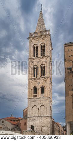 Tall Bell Tower Of A St. Donata Church In Early Romanesque Architecture In Zadar Old Town, Croatia. 