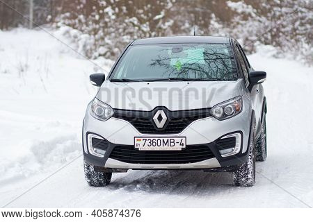 Grodno, Belarus-01.31.2021: Renault Capture Or Renault Captur Suv On A Winter Road Against The Backg