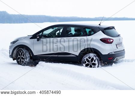 Grodno, Belarus-01.31.2021: Side View Of A Renault Capture Or Renault Captur Suv On A Winter Road Ag