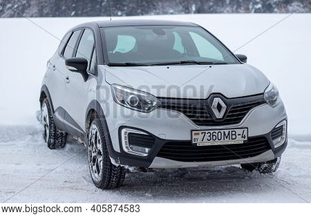 Grodno, Belarus-01.31.2021: Renault Capture Or Renault Captur Suv On A Winter Road Against The Backg