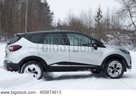 Grodno, Belarus-01.31.2021: Side View Of A Renault Capture Or Renault Captur Suv On A Winter Road Ag